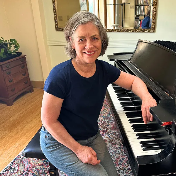 woman at a grand piano