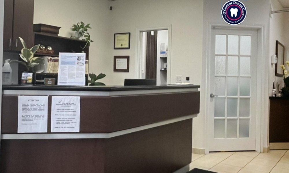 Dentist performing dental treatment on patient at O’Connor Dental Care clinic in North York Ontario