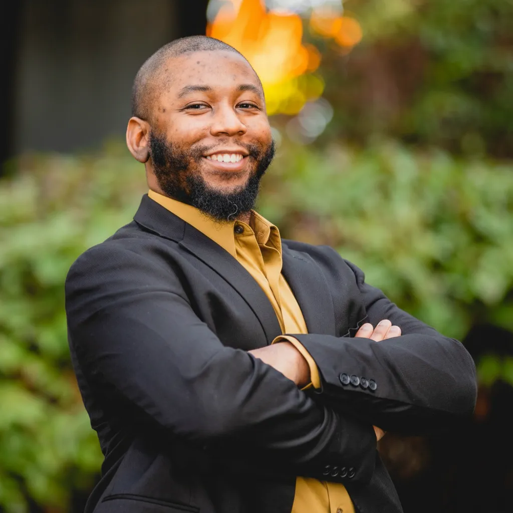 Formal portrait of DurYah Yahukhanan, founder and facilitator.