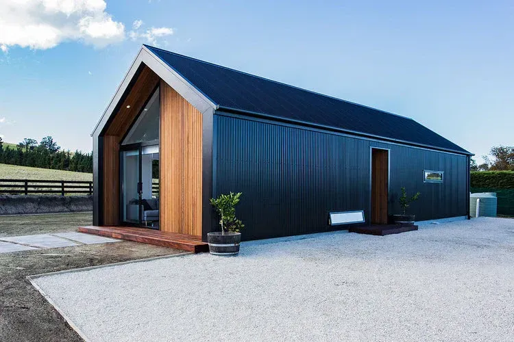 Modern agricultural metal barn by Charlotte Metal Buildings