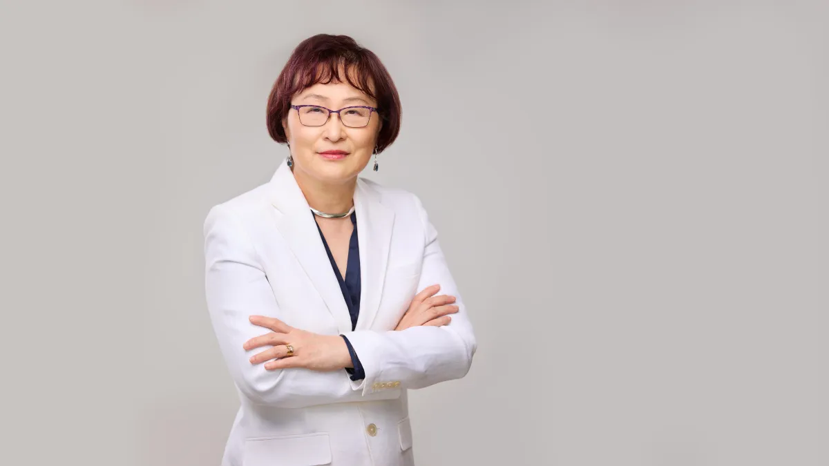 Portrait of Maya Chen, financial advisor