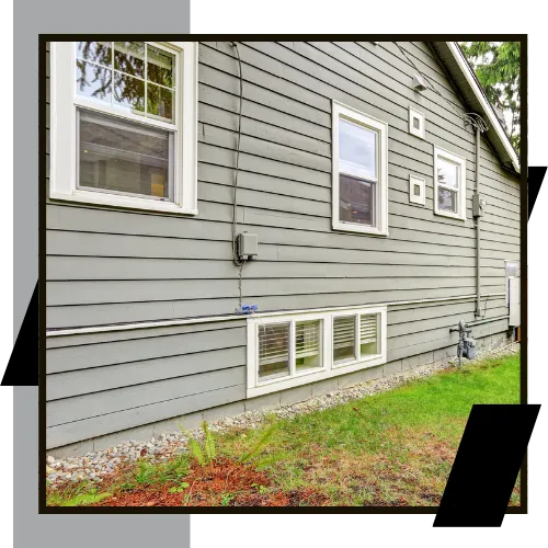 Local siding contractor checking exterior siding condition 