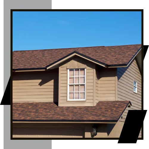 licensed and insured roofing contractor inspecting shingles