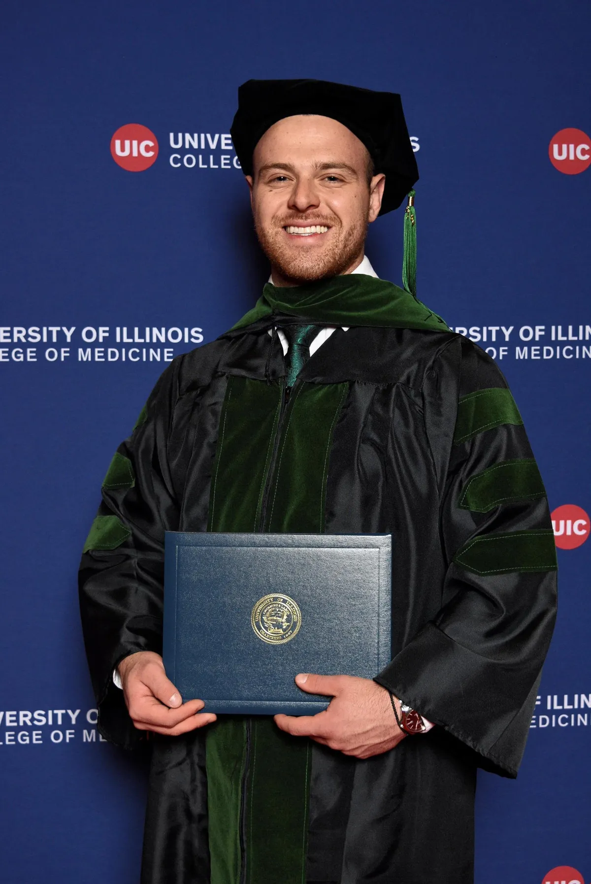 Dr. Christian Poulos at his medical school graduation