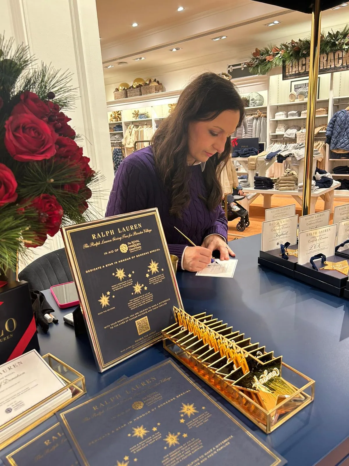 Freehand calligraphy engraving on a bottle of perfume for an in-store event