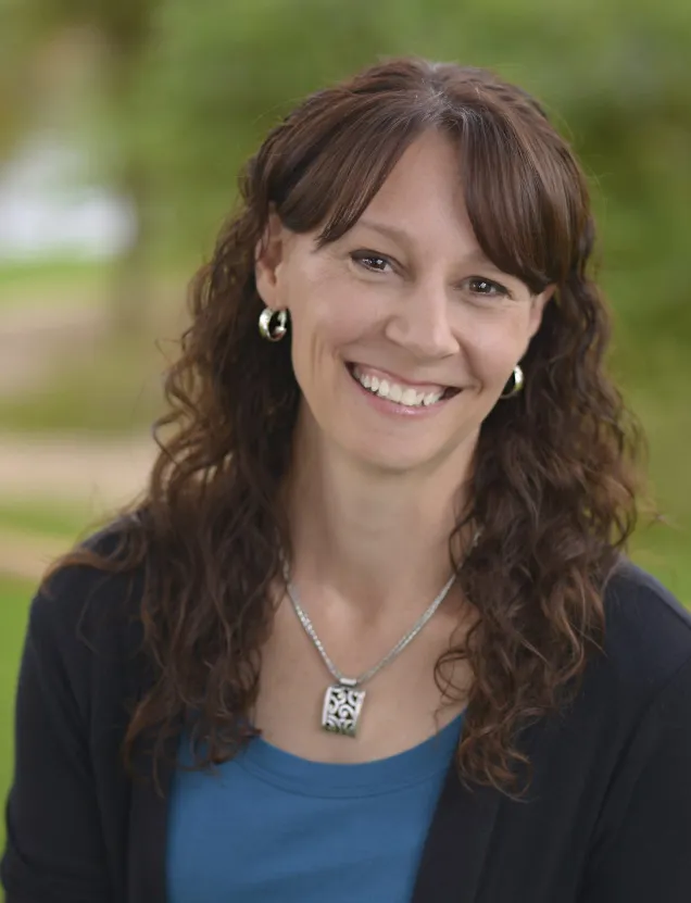 Mother meditates while son dances on couch