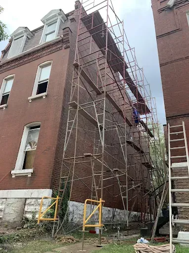 Before and after brick restoration on St. Louis brick house