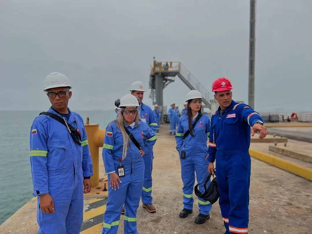 a person walking down a street at night
