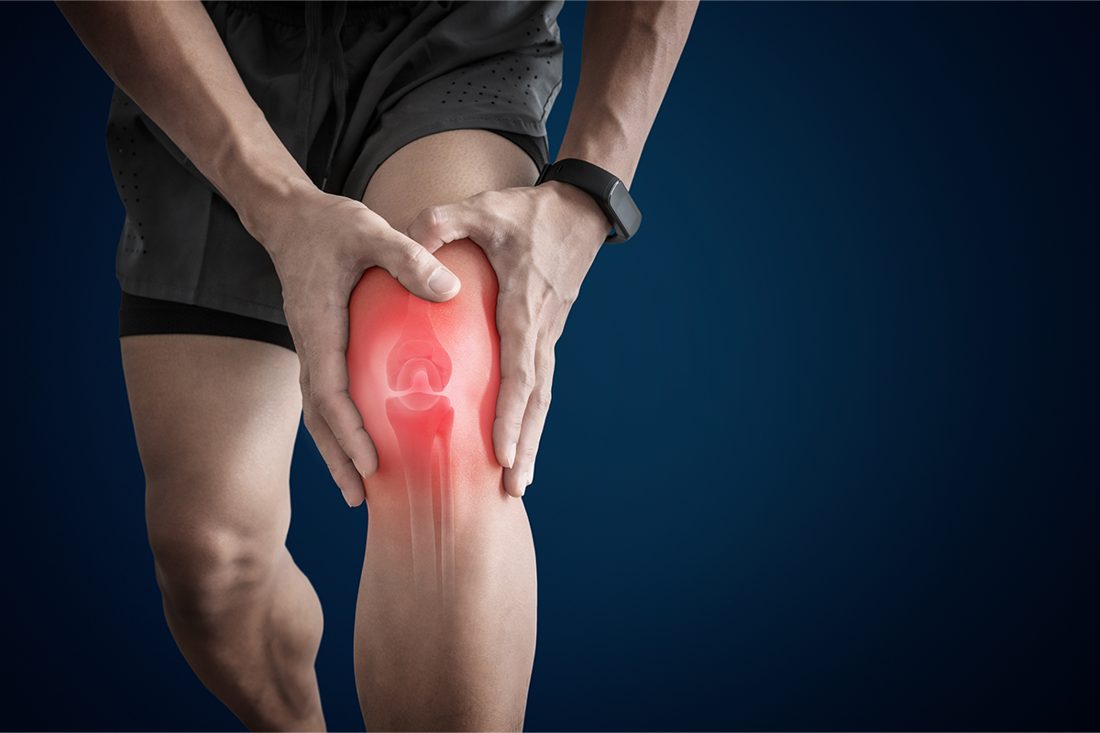 A close-up of a person's hands indicating arthritis pain