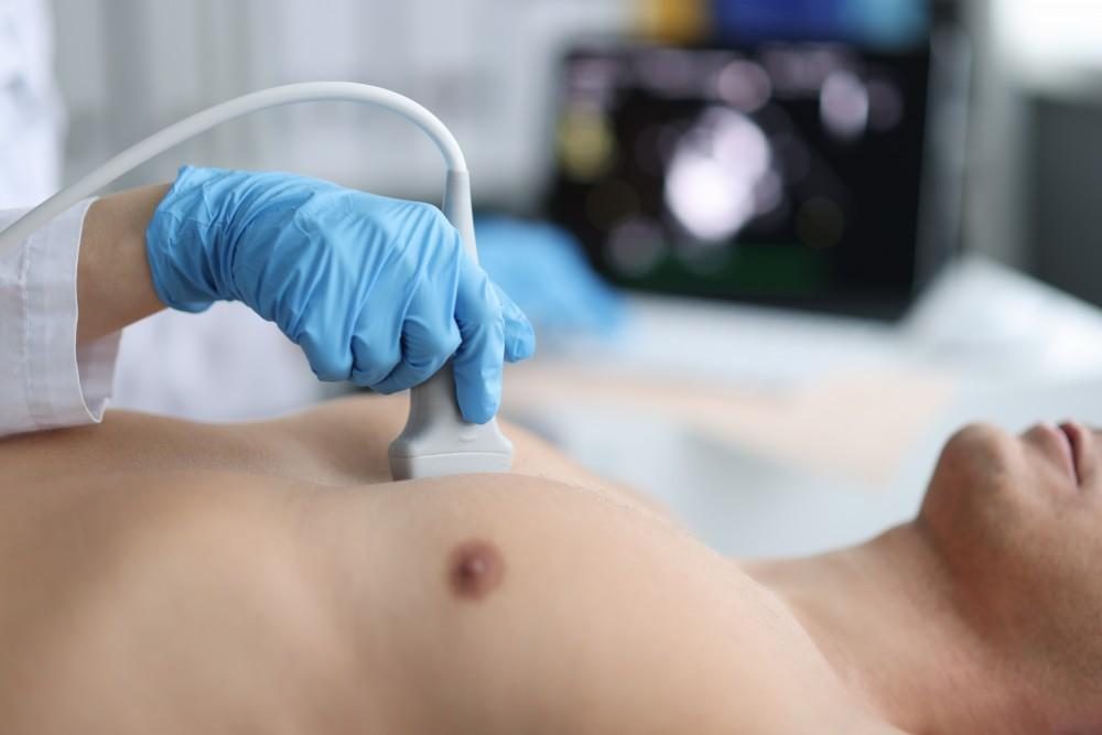 An echocardiogram scan being performed on a patient