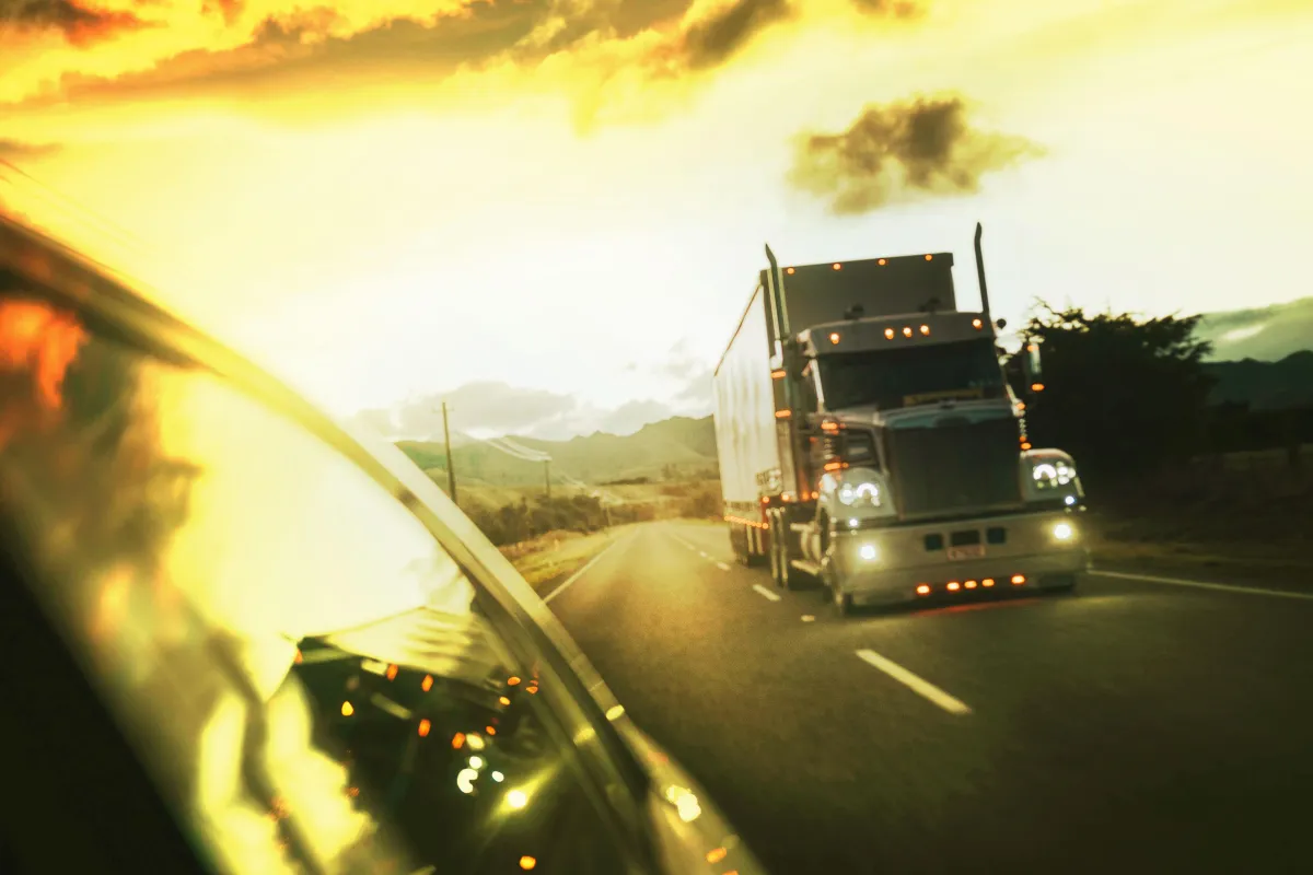 man in purple suit jacket using laptop computer