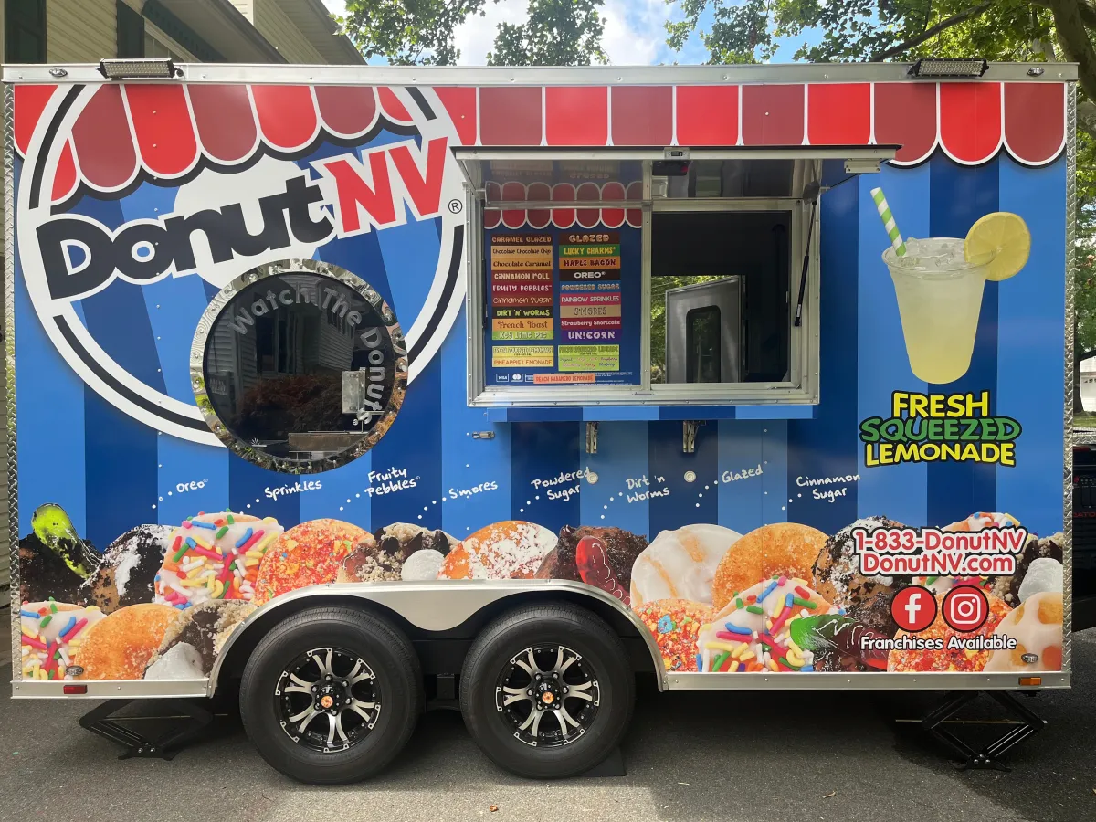 DonutNV mobile food truck parked and serving fresh hot mini donuts at a community event in North Jersey
