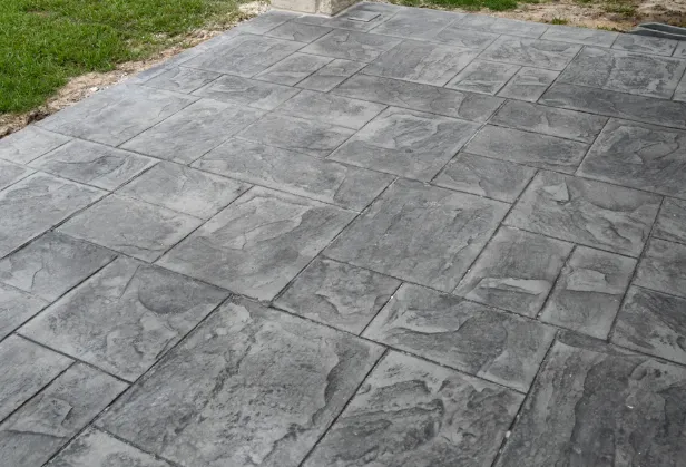 Gray block privacy wall constructed by Mundo Landscaping in Tucson, AZ — strong, clean, and long-lasting masonry installation.
