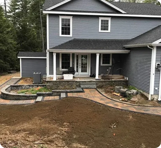 Front entrance with masonry steps and a walkway