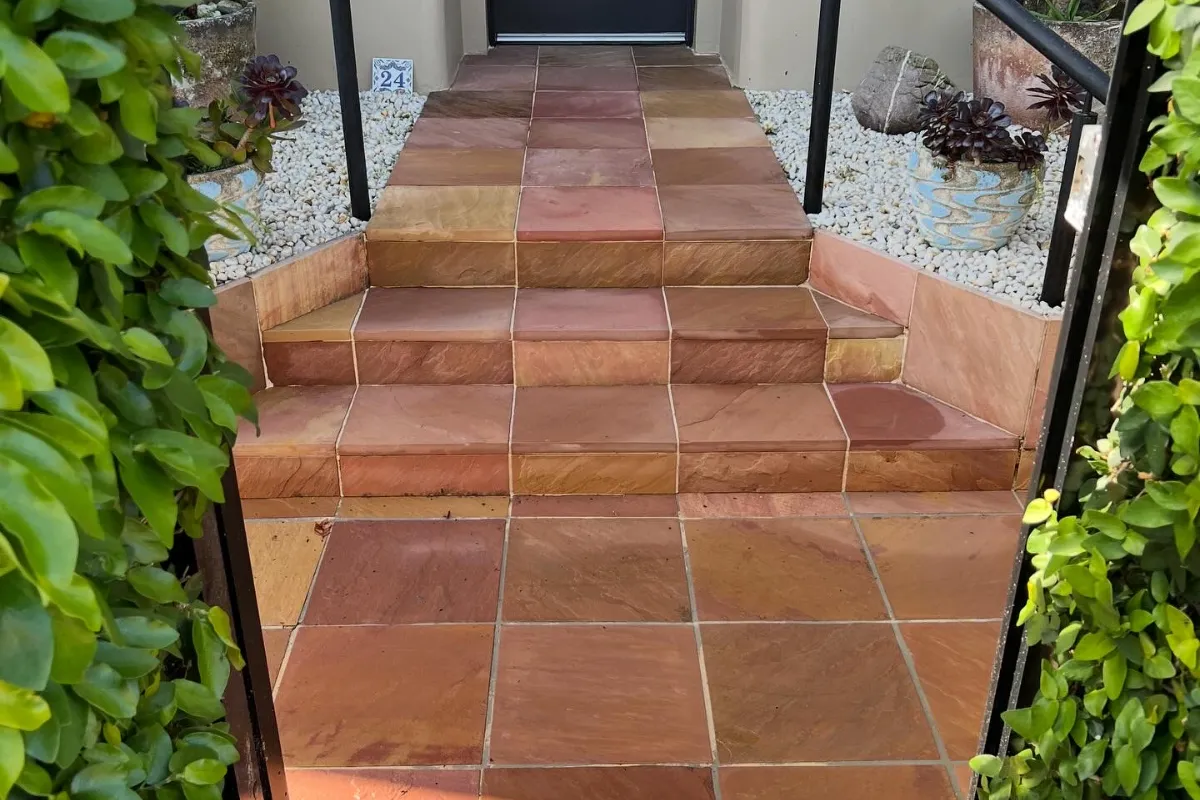 Professional high-pressure cleaning services removing dirt and grime from a concrete driveway at a residential property in Dover Heights