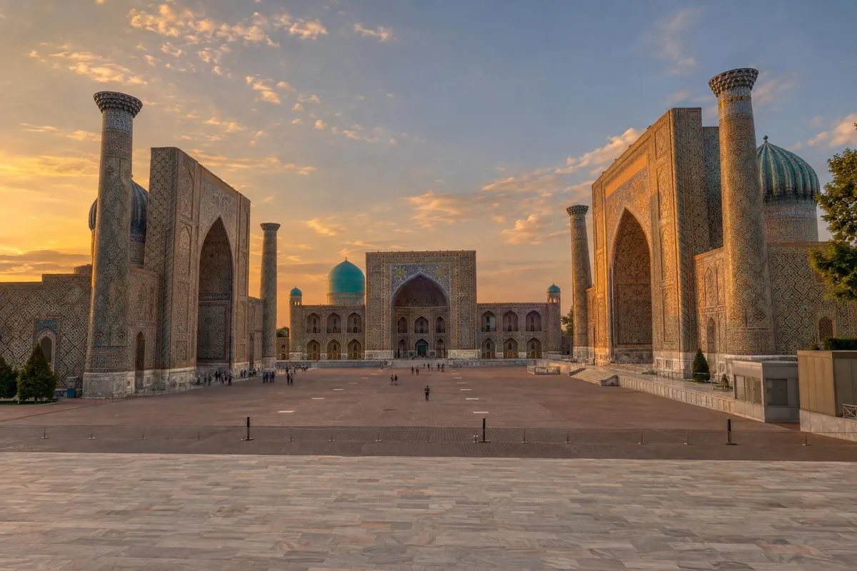 Registan Square in Samarkand at golden hour with its three tiled madrasahs and an empty foreground, evoking a short-haul trip from the UAE