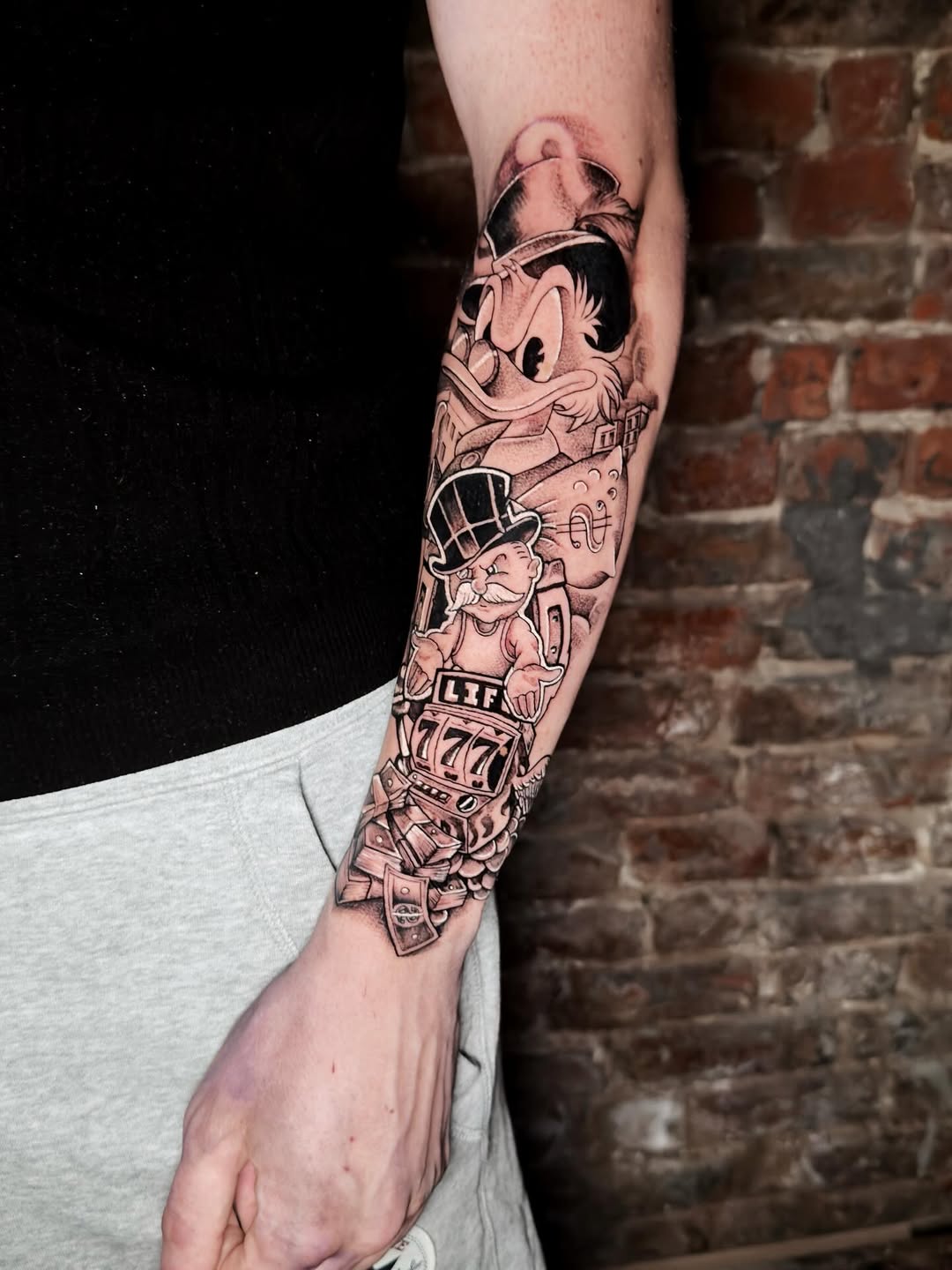 person with tattoo on right arm