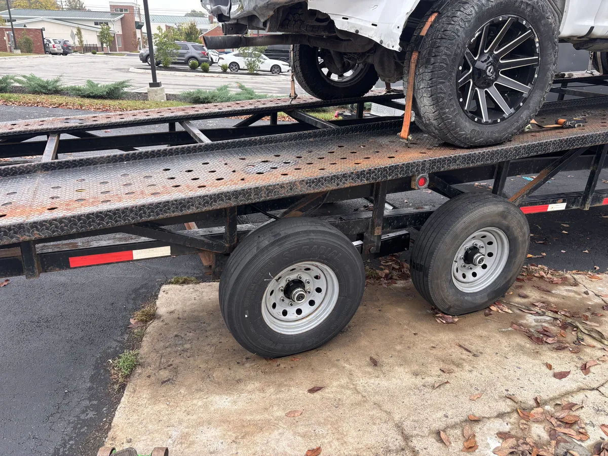Tandem axle car hauler trailer in for general maintenance at Adventure Rentals in Shelbyville, KY