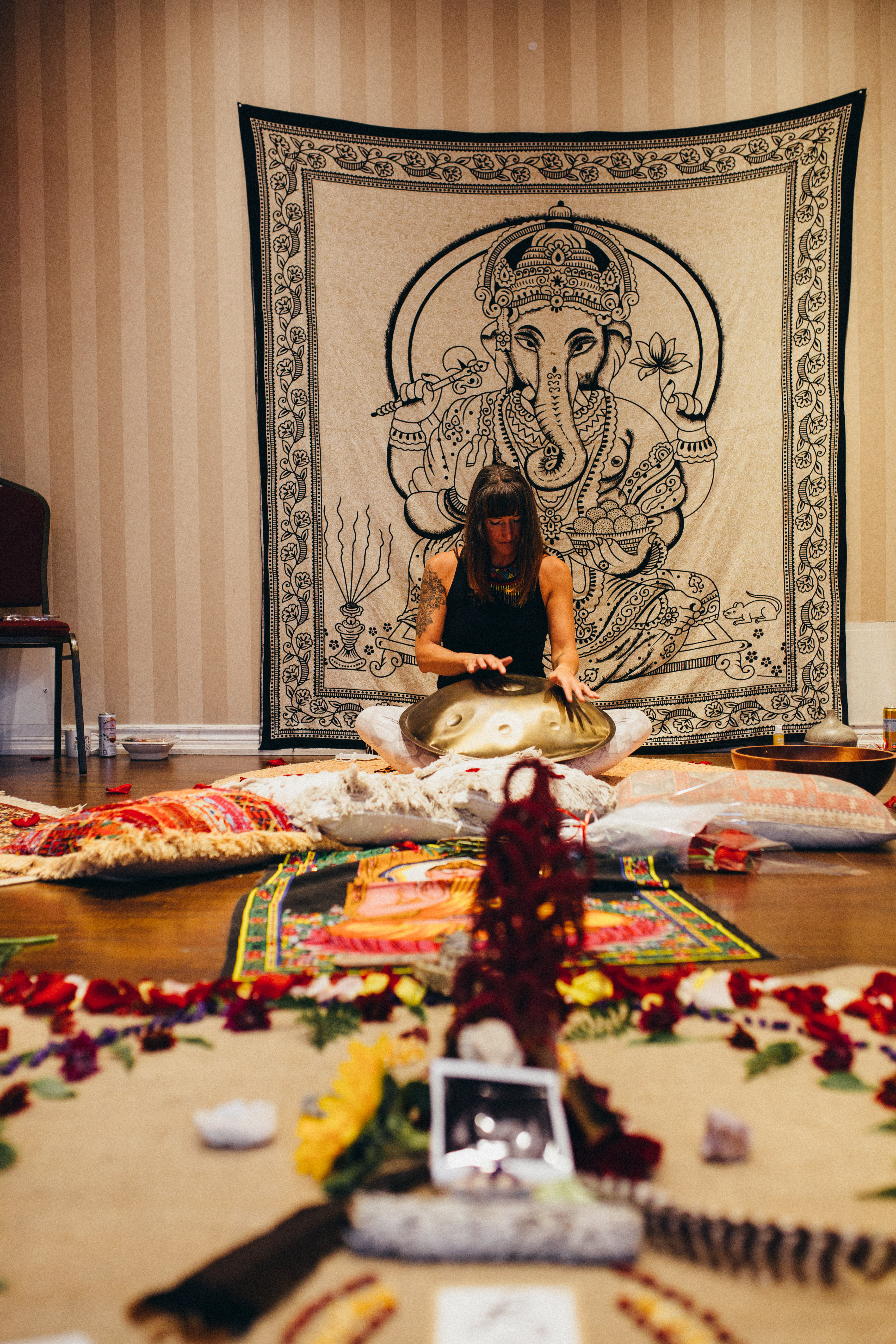 Woman meditating in preparation for sound ceremony