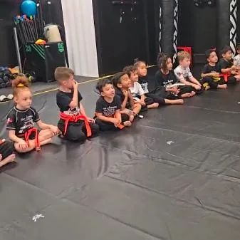 a dog standing on a sidewalk