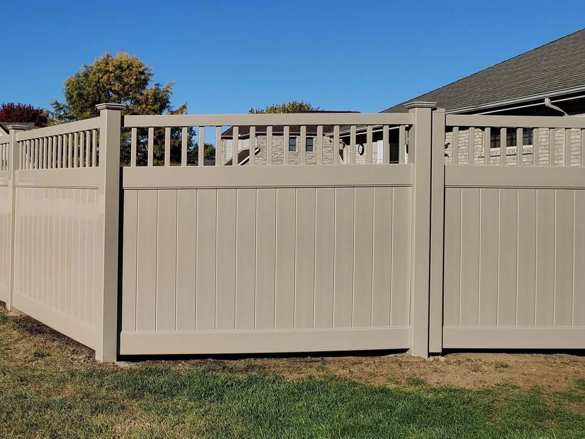 a fence covering a barn