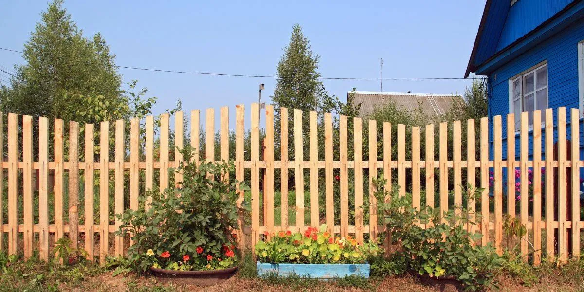 a wooden fence of a garden