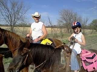 Founder as a child with her first horse