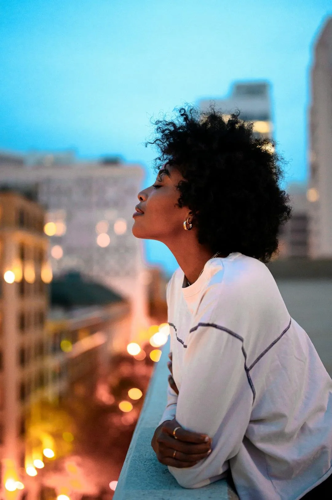 woman on her balcony peaceful