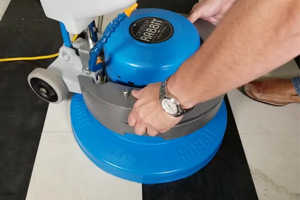 Rabbit-3 cleaning school hallway floor