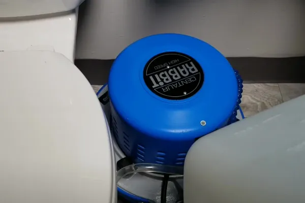 School custodian using Rabbit-3 floor machine