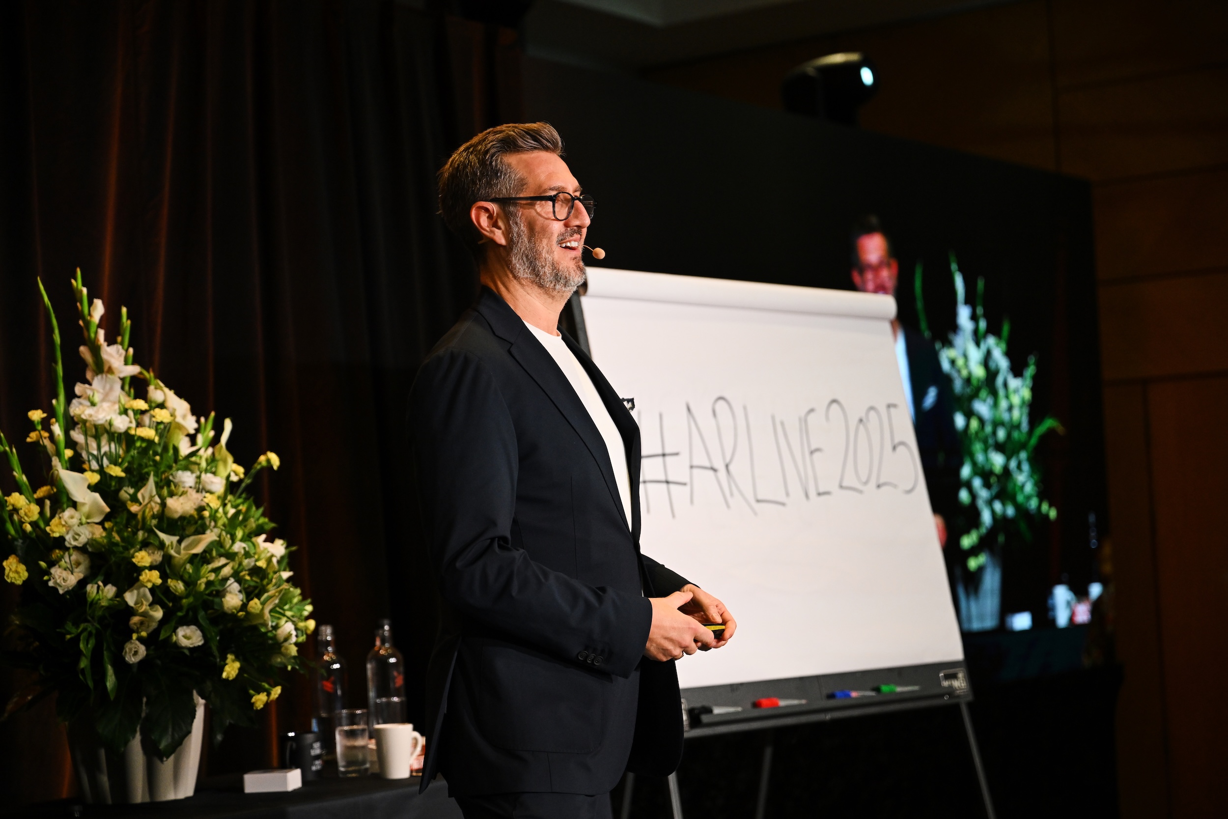 Tony Morris presenting at Agent Rainmaker LIVE 2025