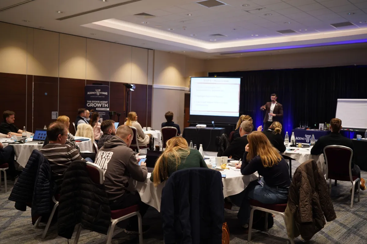 Ali Durrant, Lead Coach and Director discussing strategies with Estate Agents