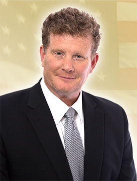 Joe Martin Mitchell III, Board Certified Civil Trial Lawyer, photographed at his law office in Indialantic