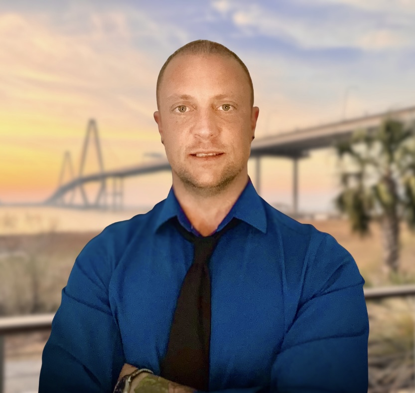 A woman sitting on a dock in front of a body of water