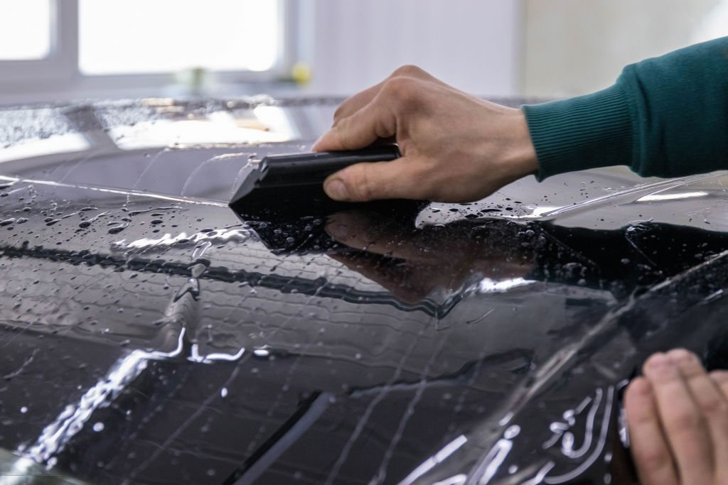 Expert vinyl wrap application and partial car wrapping service in Boca Raton