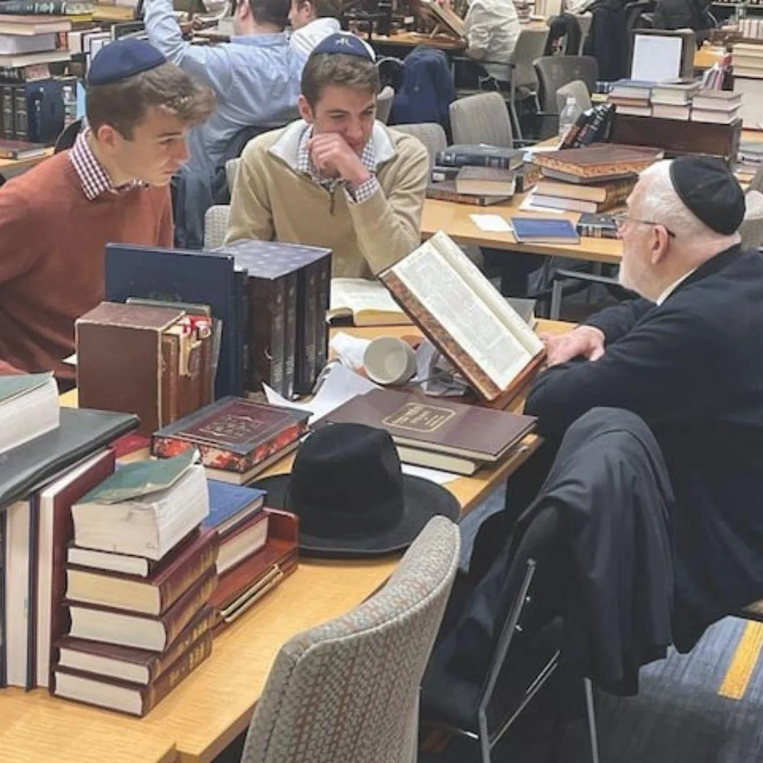 person writing on white paper