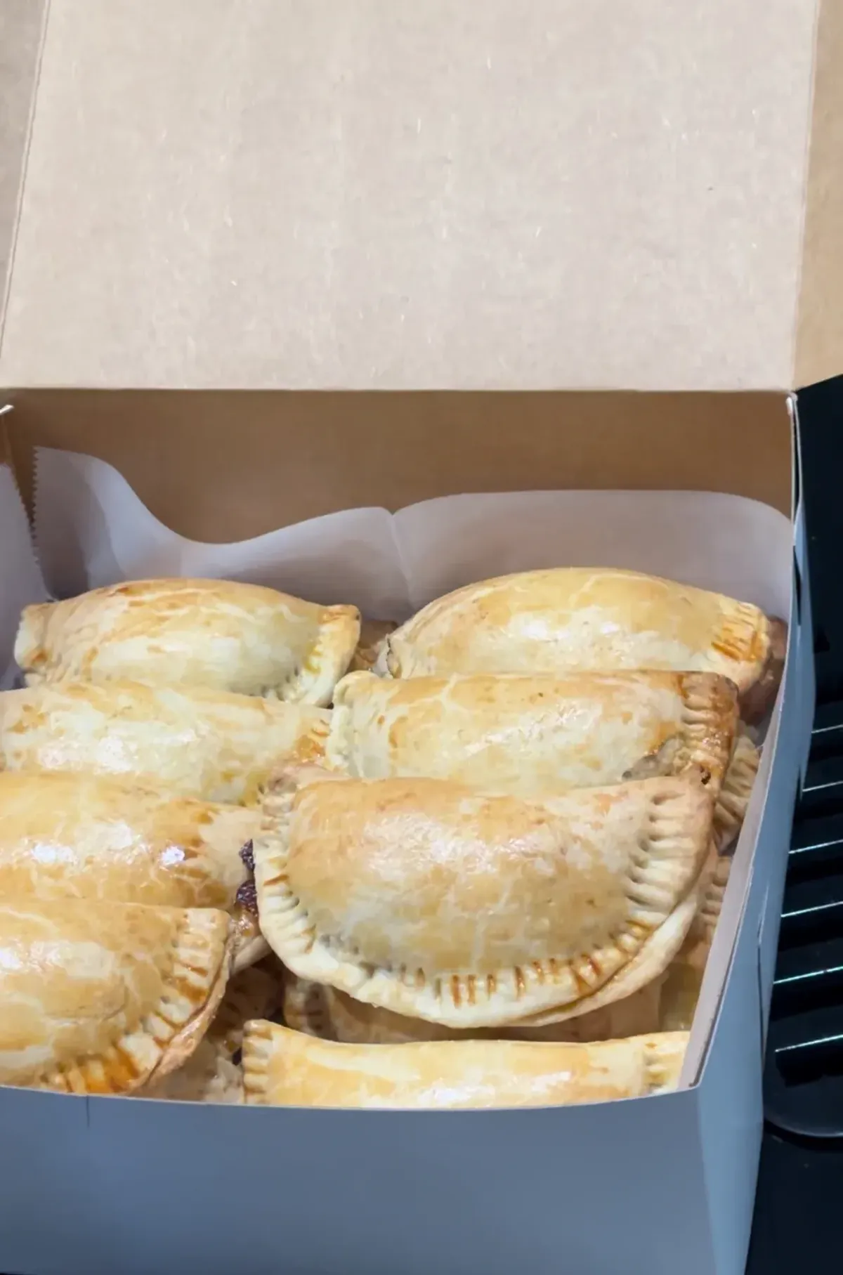 Golden flaky savory meat pies fresh from the oven
