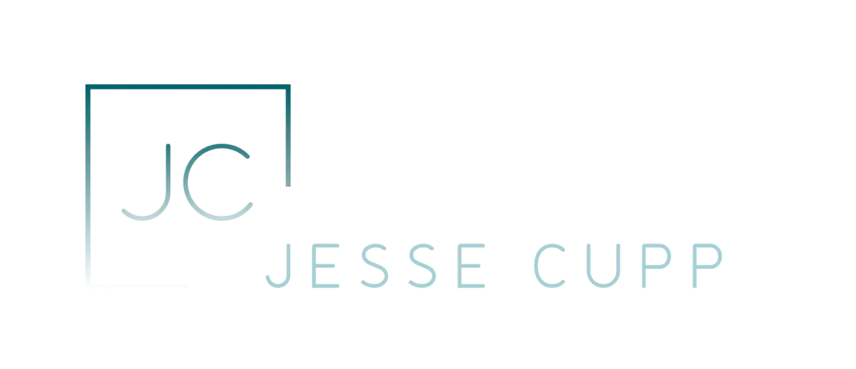 Official branding for Jesse Cupp featuring a minimalist cyan JC logo icon and the tagline 'God's Kingdom. Your Reality.' set against a professional dark smokey background. This header represents the Jesse Cupp brand and ministry.