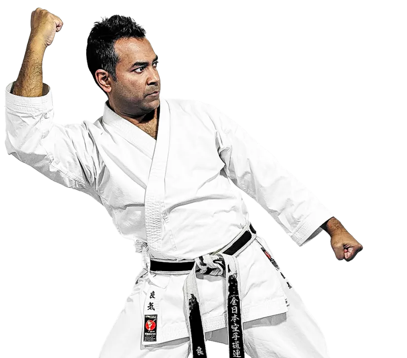 Experienced karate instructor at Rei Karate in Barrie demonstrating proper Rei posture and etiquette.