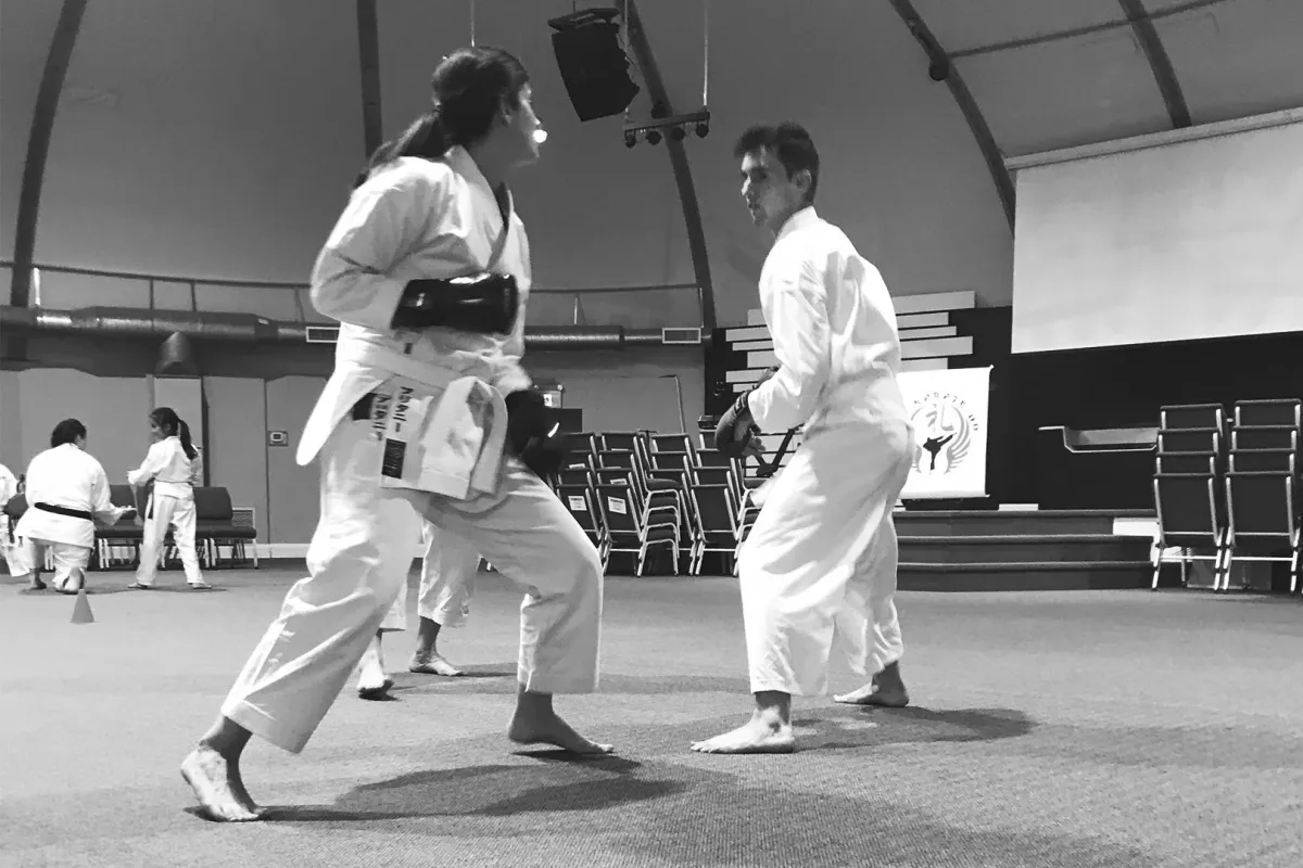 Determined adults in a karate class at Rei Karate in Barrie, demonstrating focus and discipline through Rei.