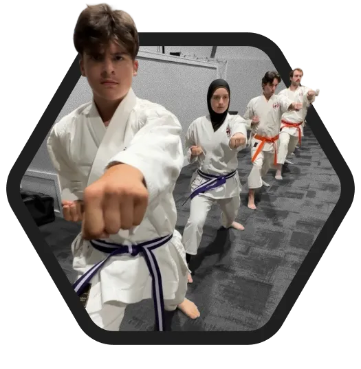 Image of students practicing karate at Rei Karate in Barrie, emphasizing the benefits of focus, discipline, and respect.