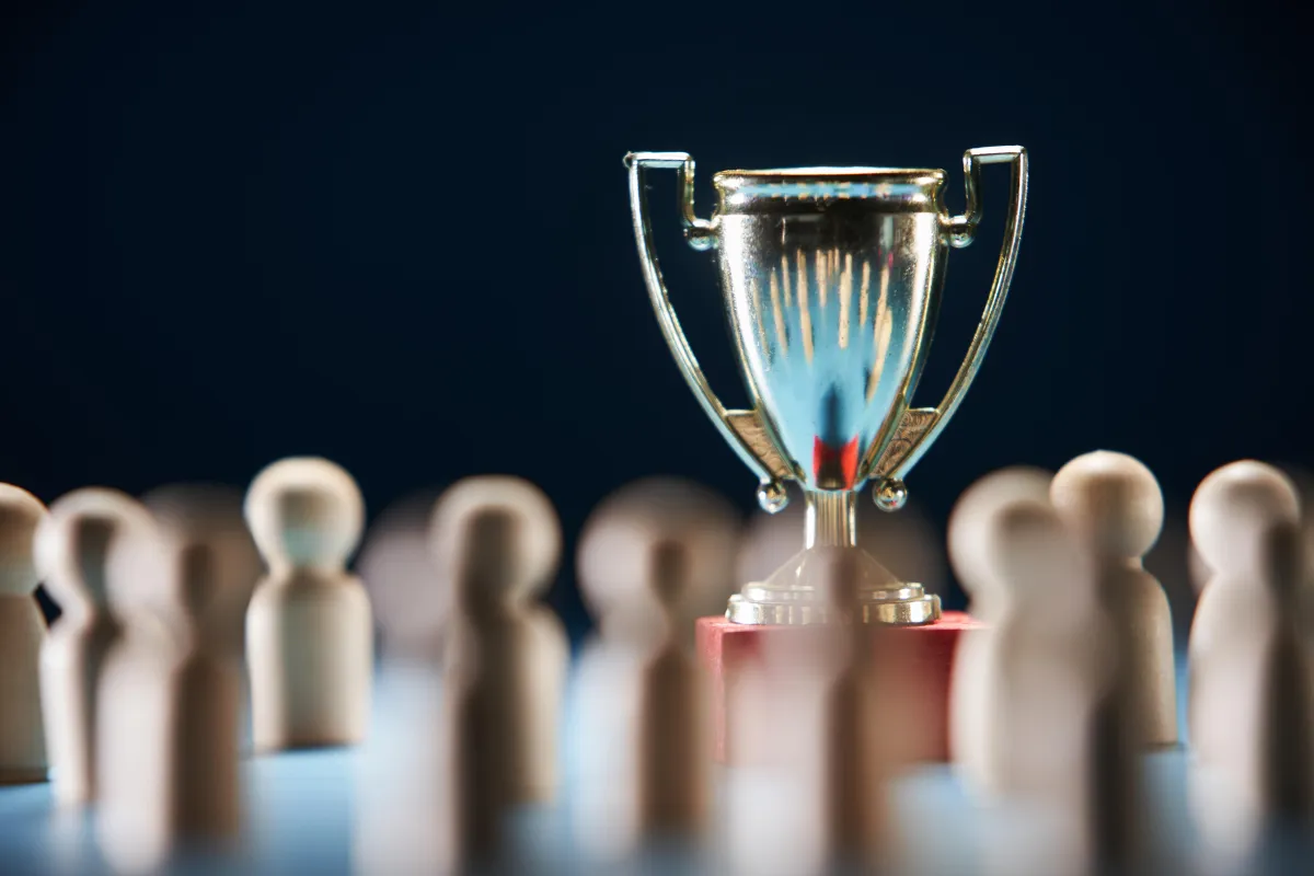 a glass trophy on a table