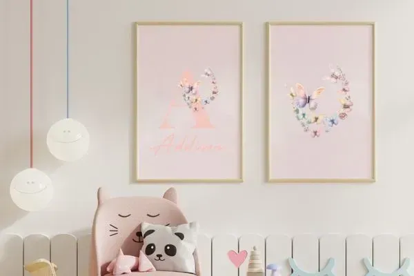 personalised baby wall art for nursery featuring baby's name and butterflies in pink
