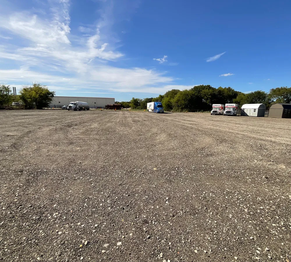 Outdoor parking area at Mega Space Rentals & Services in Bryan, Texas, with space for RVs, commercial trucks, trailers, and equipment.