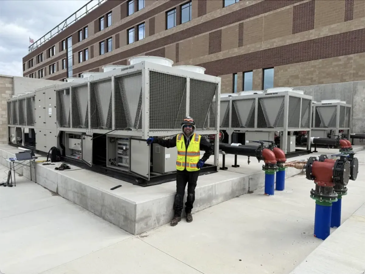 aerial photography of gray roof buildings on body of water
