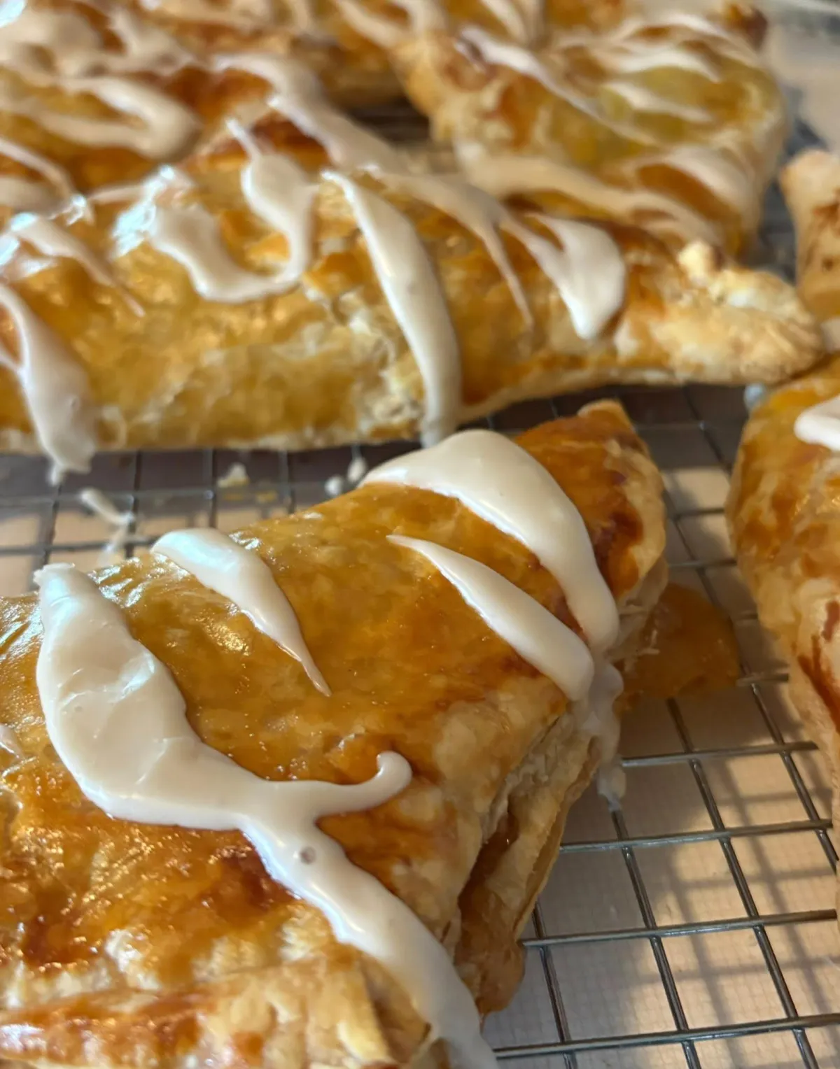 Buttery croissant with flaky layers and golden sheen.