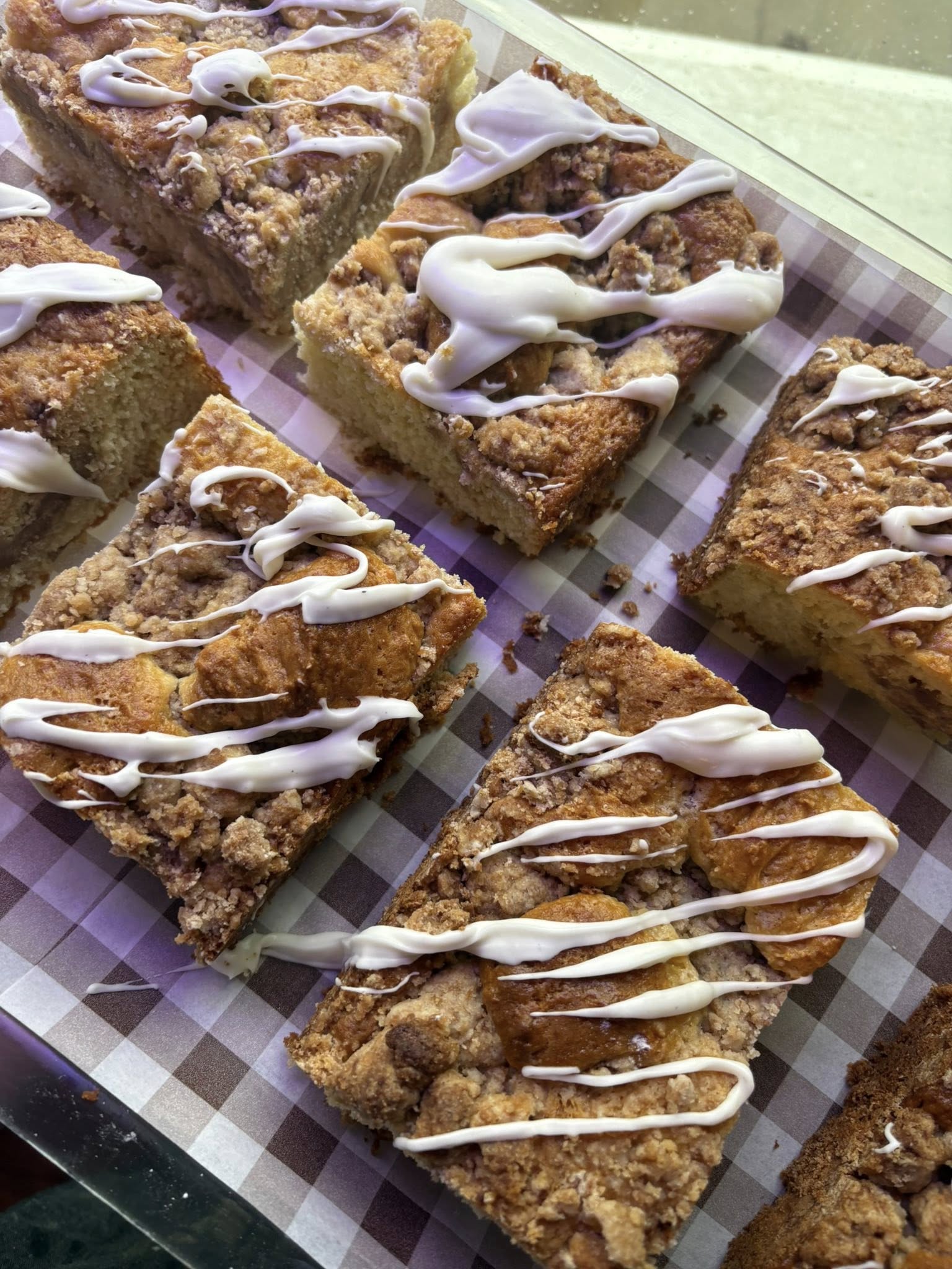 Square tile of stacked baguettes with golden crust and clean edge crop.