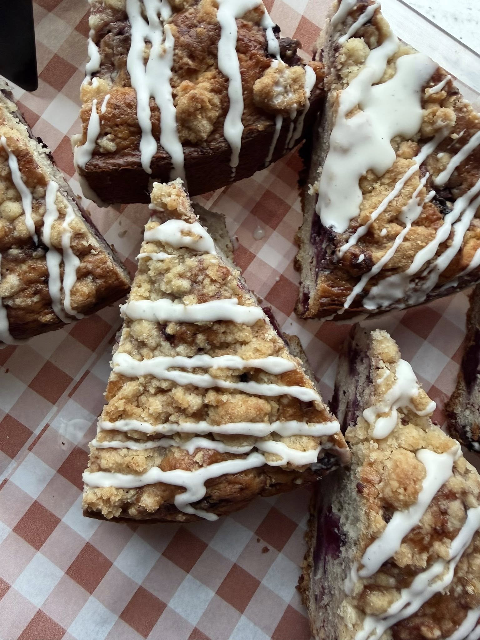 Square tile of stacked baguettes with golden crust and clean edge crop.