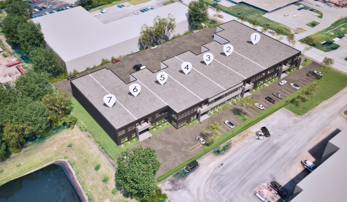 a living room filled with furniture and a painting on the wall
