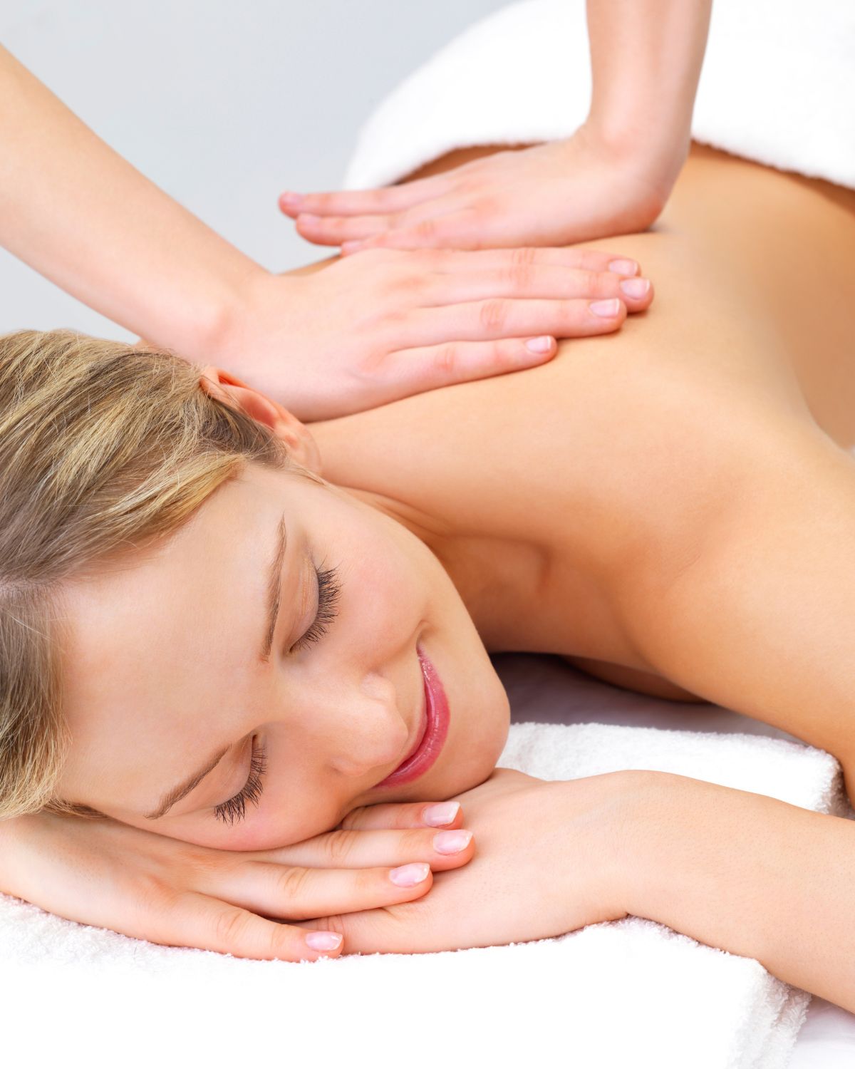 Professional Thai massage therapist providing relaxing massage in